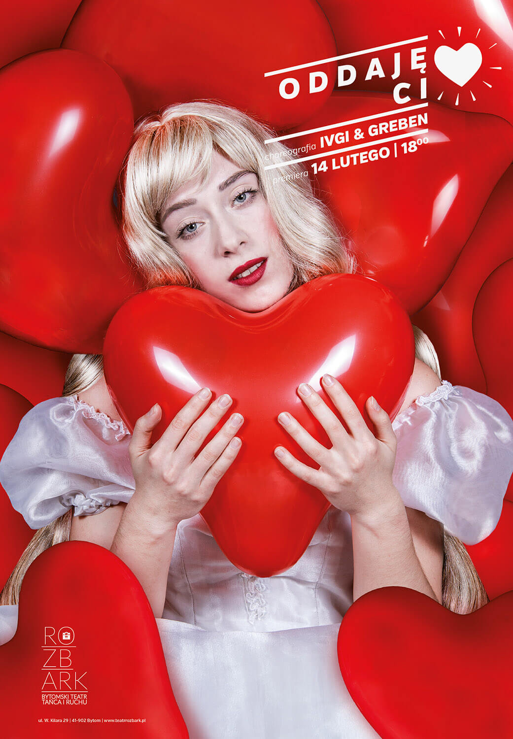 Plakat ze spektaklu Oddaję Ci serce. Na plakacie znajduje się kobieta ubrana w białą bufiastą sukienkę. Kobieta jest otoczona z każdej strony czerwonymi balonami w kształcie serc. W prawym górnym rogu umieszczony jest biały napis Oddaję ci – rysunek serduszka- a poniżej choreografia: Ivgi&Greben,premiera 14 lutego 2015